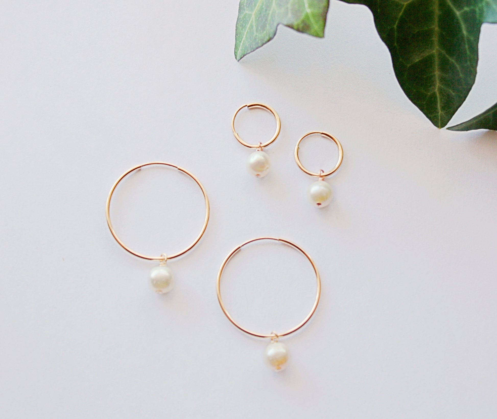 Single pearl hoops 1 inch and 1/2 inch