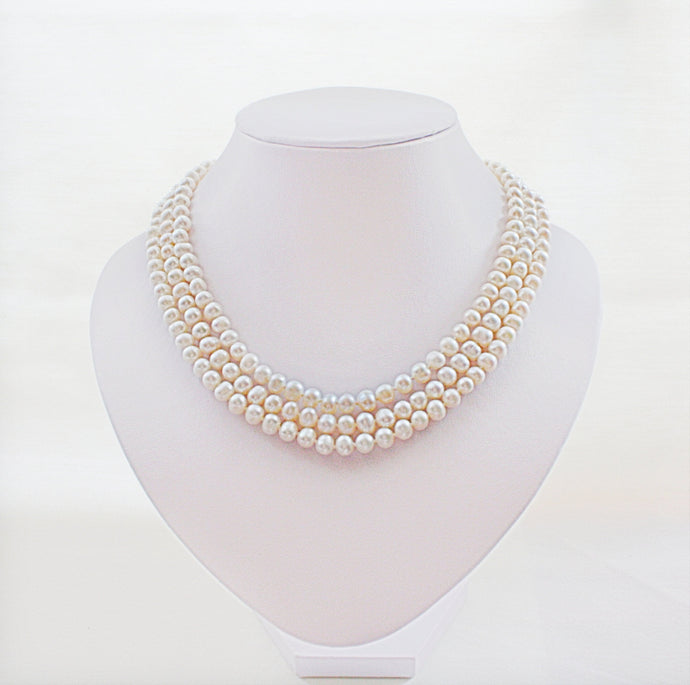 three strand pearl necklace front